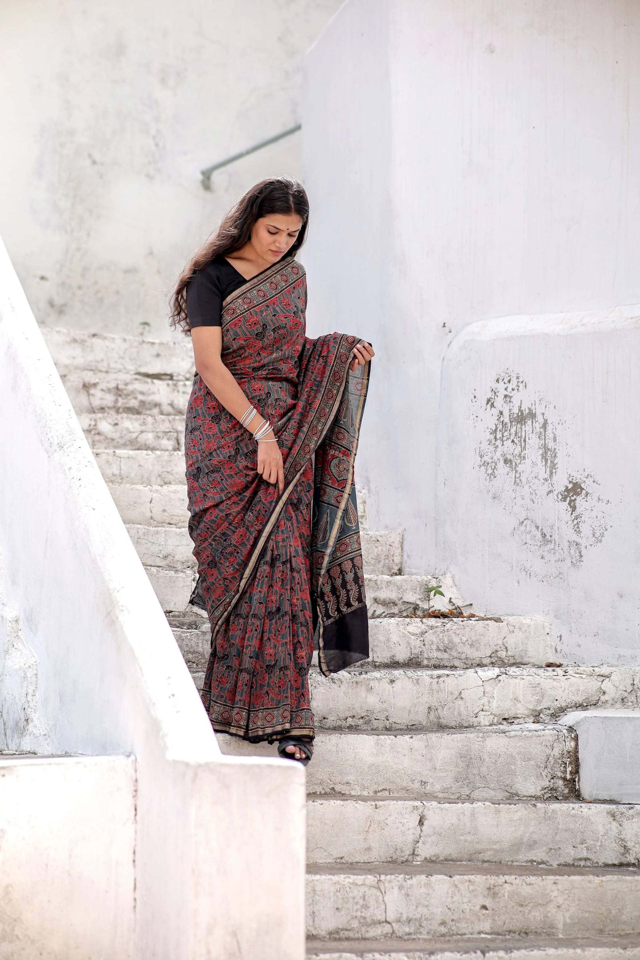 A trsyt with Ajrakh -Jharokha -Geometric Blue and Red Chanderi ajrakh saree - Image 13